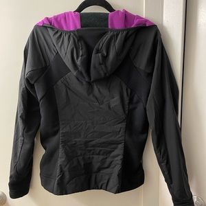 Black and purple North-face zip up jacket